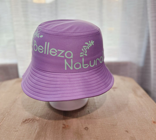 Purple Bucket Hat With Saying " Belleza Natural ". 